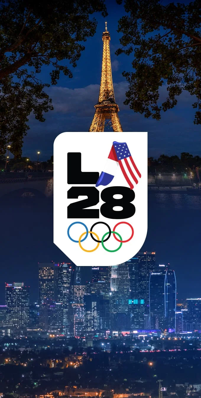 A photograph of the Eiffel Tower with the Olympic rings on it to the left and a photograph of the Los Angeles downtown skyline at night. An image of the LA28 Handover A emblem with the Olympic rings underneath on a white background over the photograph.