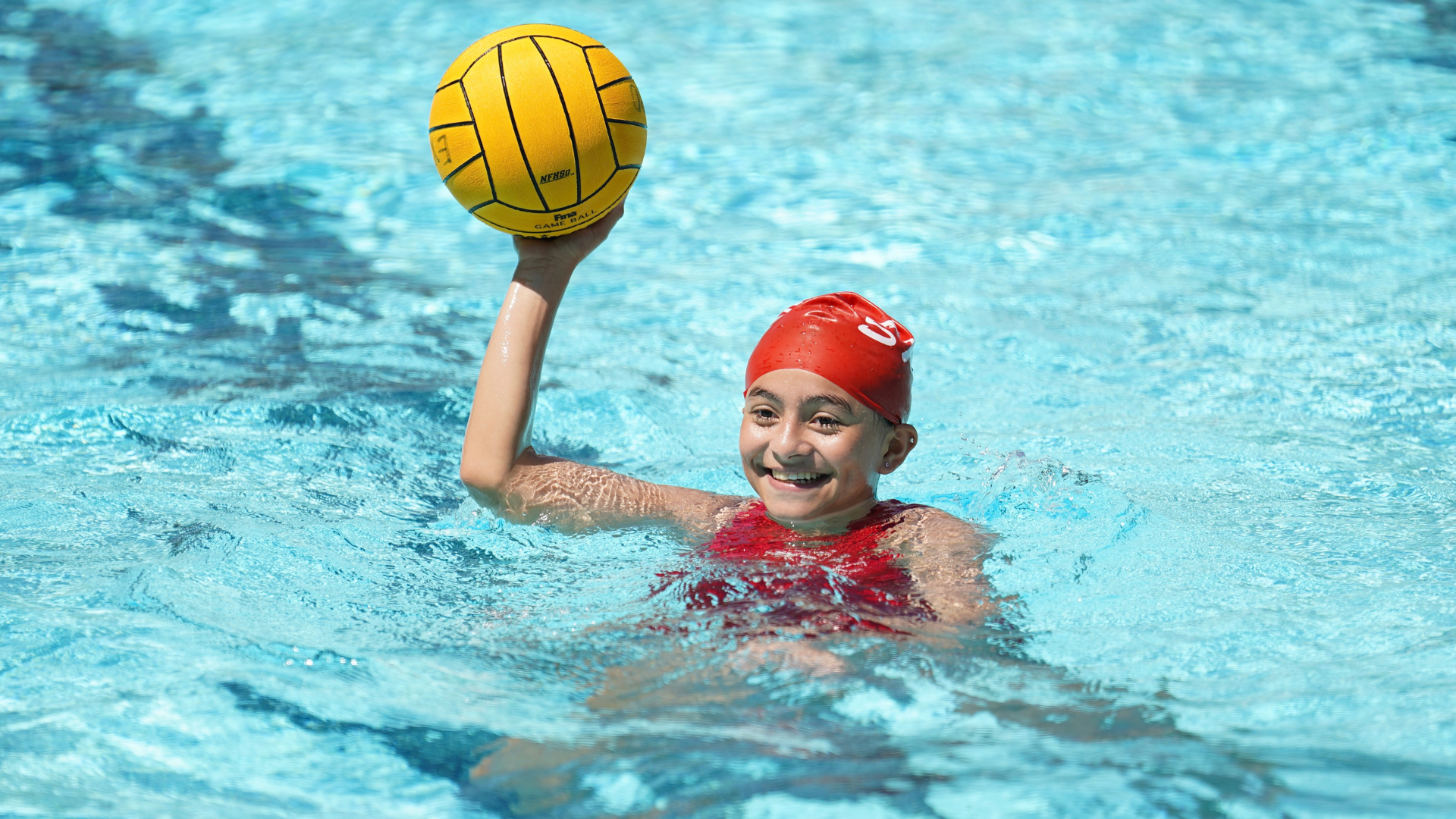 Youth playing water polo at PlayLA 